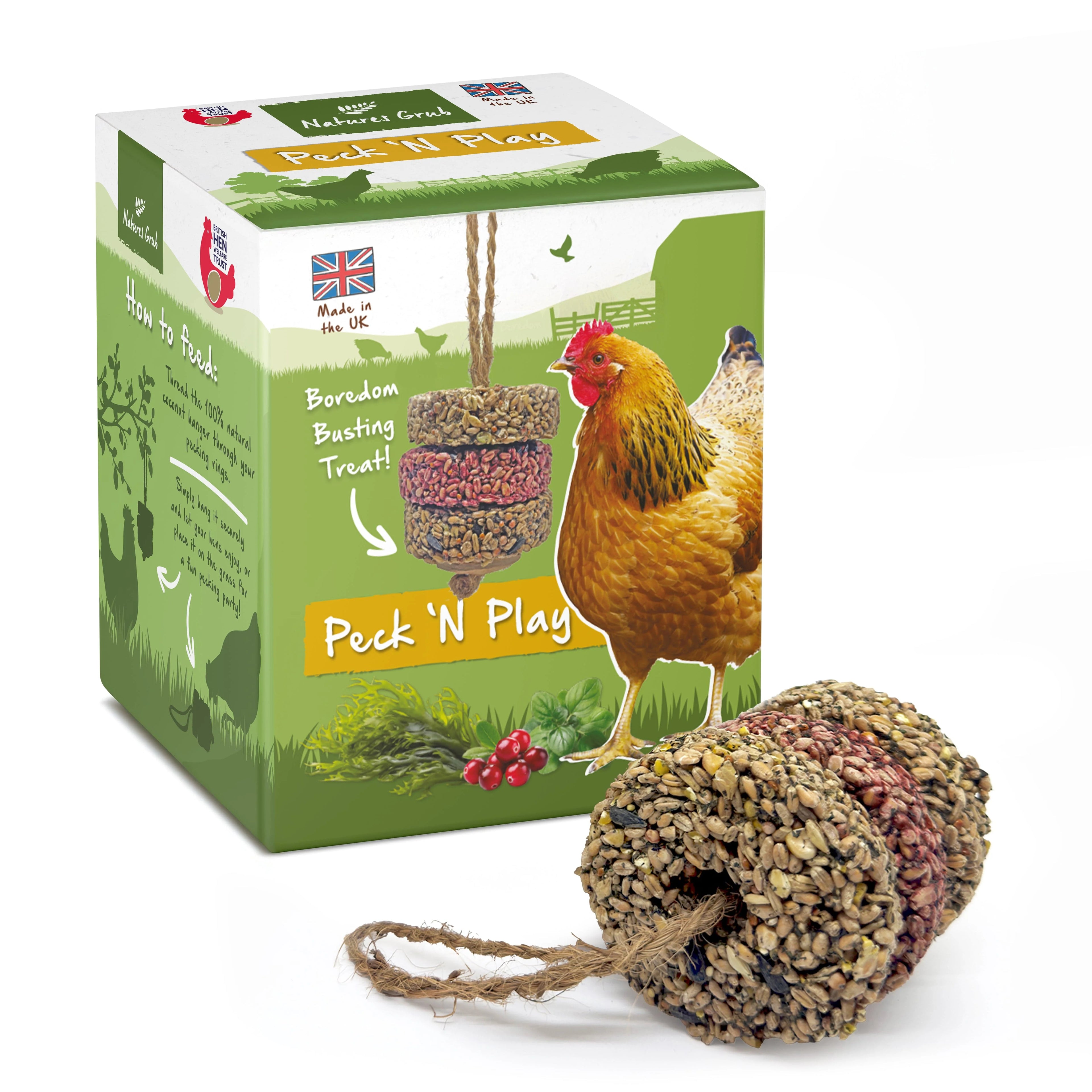 Natures Grub Peck n Play Hanger box beside the seed treat cake hanging on its cord